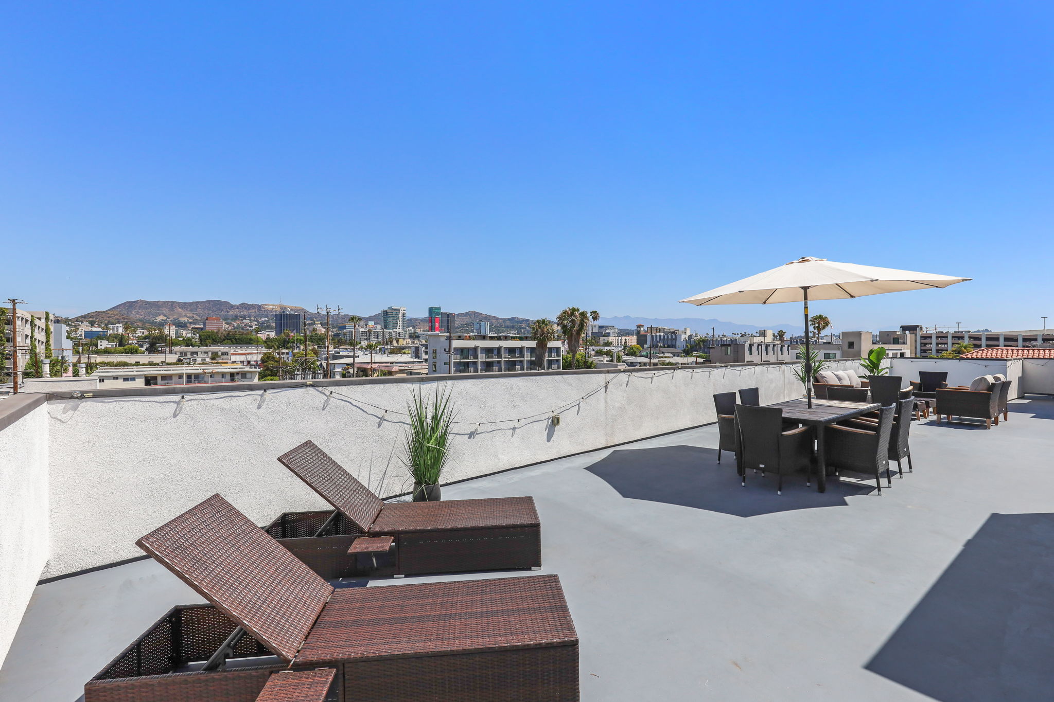 Shared rooftop deck with panoramic views